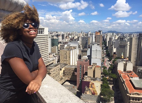 Sao Paulo skyline with student